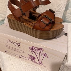 Blowfish super cute and comfortable wedges.  Very well cared for, minimal wear.